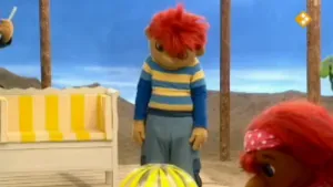 Rollen door het zand