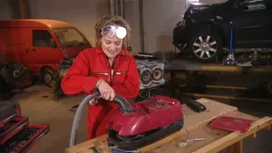 Een slang, ventilator en stofzuigerzak