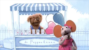 Tekening van een marktkraam met erin gemonteerd foto van Tommie en van Ieniemienie.