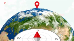 Tekening van de aarde waarop de Noordpool is aangewezen, ervoor een kompas met de wijzer, de kompasnaald, naar het Noorden.