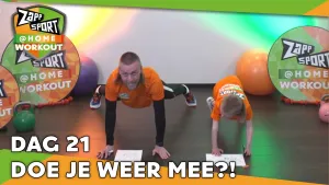 Foto van scène uit Zapp Sport met Nathan Rutjes en zijn zoon op het podium aan het sporten, logo's in beeld en de tekst "dag 21 doe je weer mee?!".