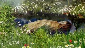 Foto van een sloot met oevers vol bloemen waarin getekend op haar rug een meisje ligt.