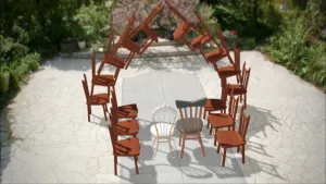 Een animatie van twee lichtbruine stoelen met een witte en grijze zitting en meerdere donkerbruine stoelen buiten op een tuinpad. Op twee van de donkerbruine stoelen staan vier andere donkerbruine stoelen naar elkaar toegebogen in een soort boogvorm.
