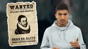 Een foto van Nizar die naar de camera wijst. Links hangt een poster zoals de politie van toen ophing. Op de poster staat Willem van Oranje zijn naam en zijn portret, "wanted dead or alive", dat betekend gezocht, dood of levend en "25.000 gouden kronen".