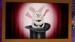 Een foto van een scherm met een bruine rand eromheen. Op het scherm is een plaatje van een pop van een konijn met een witte vacht en zwarte strik op zijn buik te zien. De pop komt uit een grote zwarte hoed en heeft twee poten omhoog en de bek iets open.