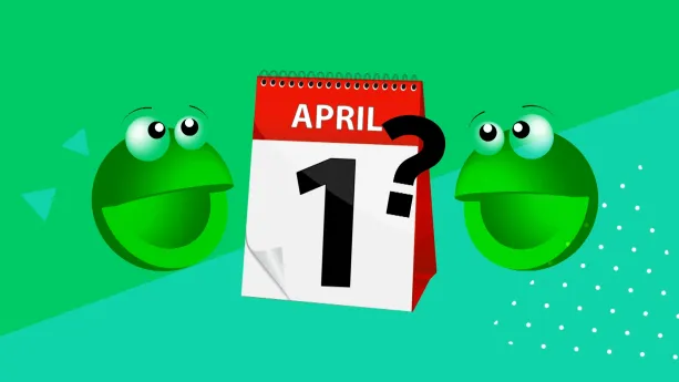 Een animatie van twee vrolijk kijkende, groene bolletjes met twee ogen en een open mond zonder tanden. Tussen de bolletjes in staat een kalender die is opengeklapt op de dag 1 April. Naast het rechterbolletje, deels op de kalender, staat een vraagteken.