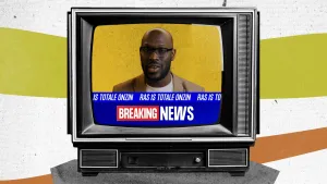 Een animatie met daarop een getekende televisie van een oud type. Op de televisie is een programma te zien met daarin in beeld een man met de tekst "Ras is totale onzin" en de tekst "Breaking News".