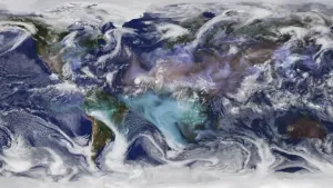 Een foto van de aarde vanuit grote hoogte genomen door een satelliet in de ruimte. Op de foto zijn bewegende wolken te zien in de lucht boven het vaste land en de oceanen.