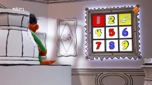 Foto van vierkant spelbord met verschillende plaatjes en cijfers en oranje pop die vanuit zetel naar het spelbord kijkt.