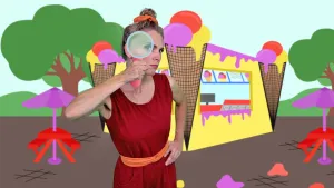 Afbeelding van een foto van de presentatrice met een getekend vergrootglas voor haar oog, de achtergrond is geanimeerd met een ijswinkel.