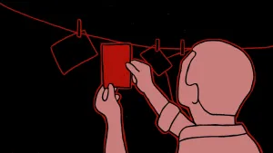 Een tekening van een man die analoge foto's aan het ontwikkelen is. Er hangen al drie foto's met wasknijpers aan een lijn, hij hangt er één bij. De kamer is donker.