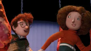 Twee animatiefiguren rennen tussen vlees door. 