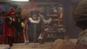 Pietje Paniek staat achter een tafel met puzzelstukjes.