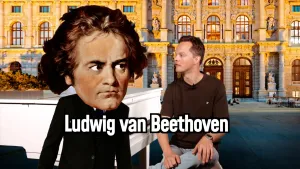 Illustratatie van poppetje met hoofd van Beethoven, naast presentator Sander Zwiep achter witte vleugel.