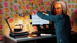 Illustratie van bureau met muur vol gekleurde postits waar figuur met hoofd van Bach een papiertje met bladmuziek ophangt.