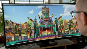 Foto van curved computerscherm met het ontwerp van een festivalpodium in junglethema.